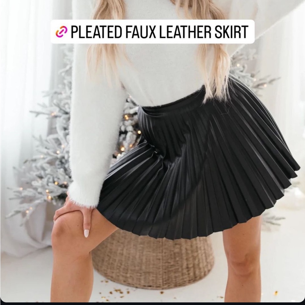 The Post black pleated mini faux leather skirt.